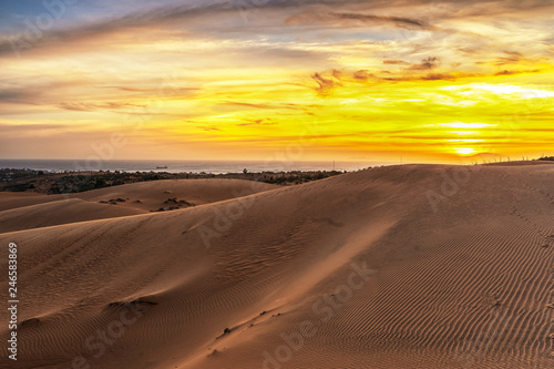 Red sand dunes in sunset at Binh Thuan near the town of Mui Ne, Vietnam. Mui Ne is popular travel destination .