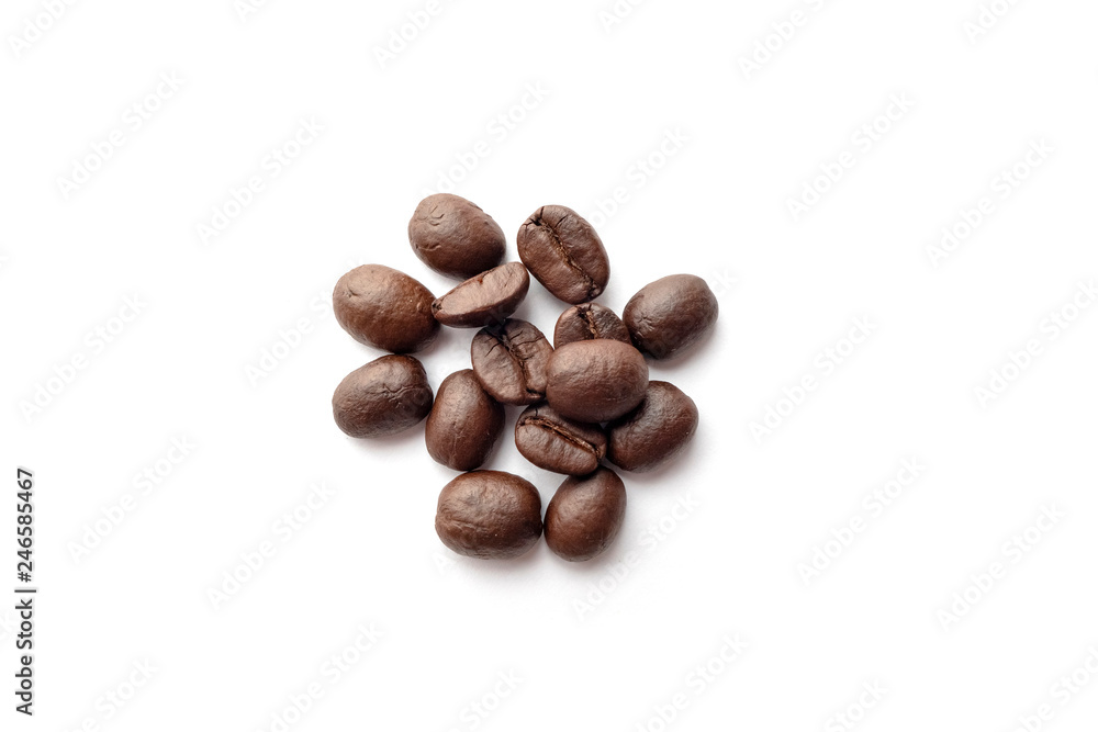 Roasted coffee beans isolated on white background. Close-up. Roasted coffee beans isolated on white background. Close-up.