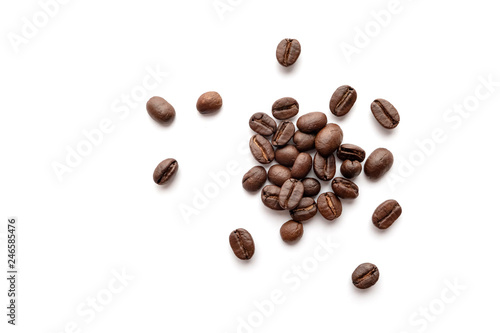 Slika na platnu Coffee beans isolated on white background. Close-up.