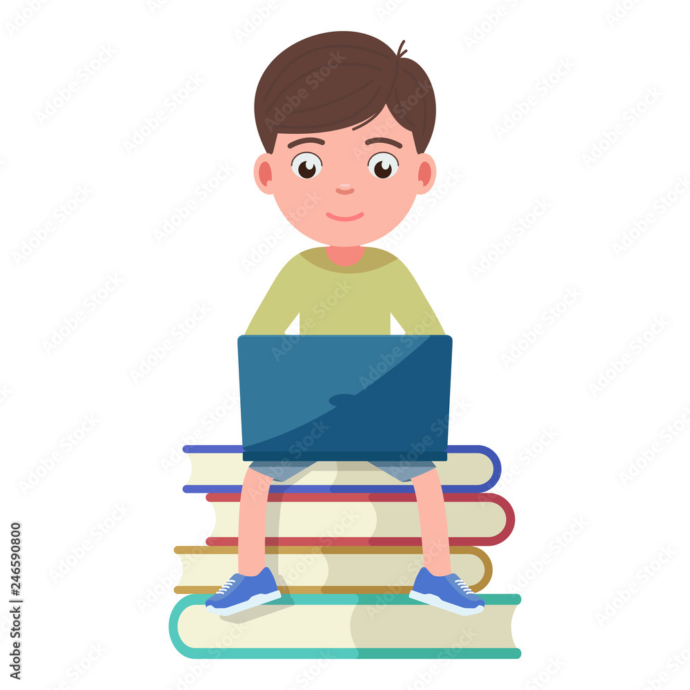 Boy sits on the book and works engaged in a laptop Boy sits on the book and works engaged in a laptop