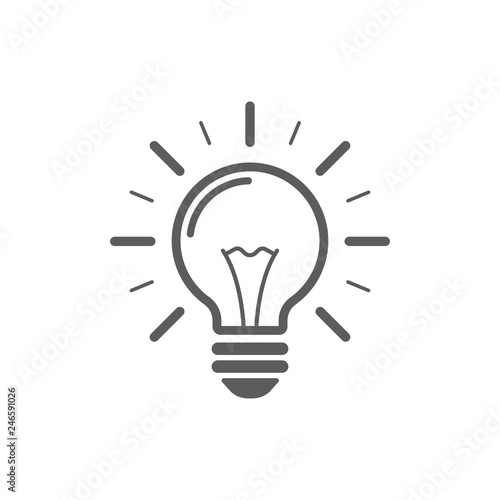 Light bulb with rays shine. Energy and idea symbol.