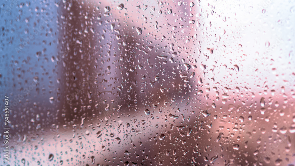view of the city through wet glass as a background for artists view of the city through wet glass as a background for artists