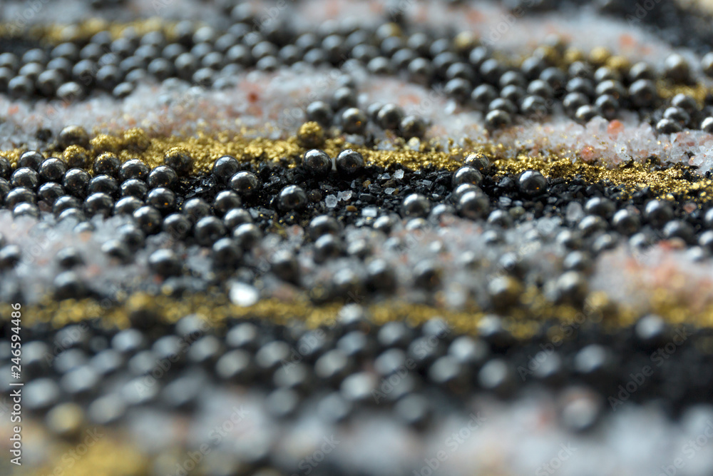 Layered blur sand pattern. Marble style background. Black and gold powder defocused texture. Layered blur sand pattern. Marble style background. Black and gold powder defocused texture.