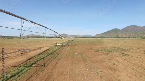 Centre pivot on a farm filmed with a drtone photo