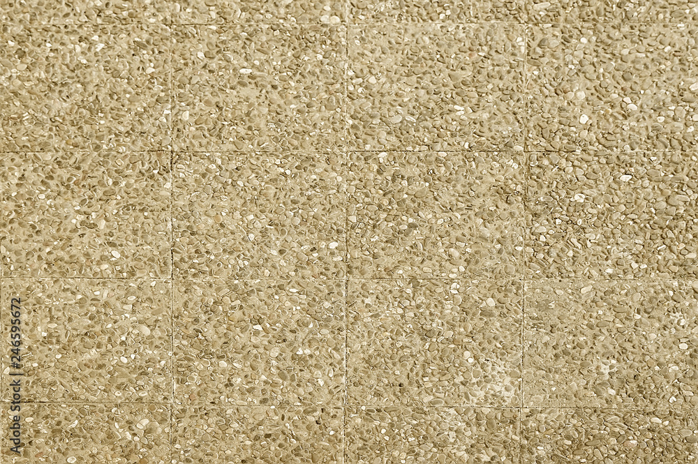 Old beige stone pavement background Old beige stone pavement background
