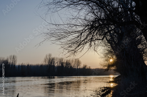 Sunset over the lake in the winter