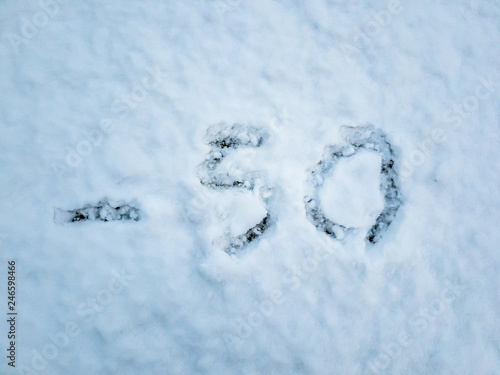 Temperature of -50 written in the freshly fallen snow © Lukassek