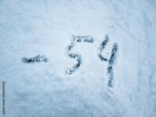 Temperature of -54 written in the freshly fallen snow © Lukassek