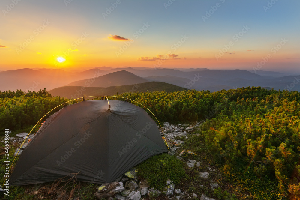 Rest in the summer in the Ukrainian Carpathians with overnight stay in a tent on a mountain top.