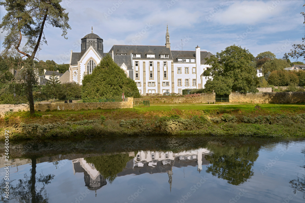 White abbey (Abbaye blanche in French) and chapel Saint Joseph on the banks of the Laita river at Quimperlé, a commune in the Finistère department of Brittany in northwestern France. White abbey (Abbaye blanche in French) and chapel Saint Joseph on the banks of the Laita river at Quimperlé, a commune in the Finistère department of Brittany in northwestern France.