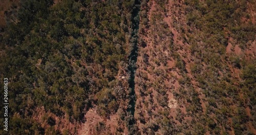Aerial Drone elevating through Australian Desert Oasis Inland river photo