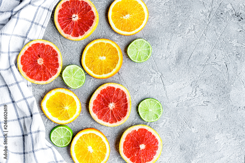 design with blood orange and lime on gray background top view mock-up design with blood orange and lime on gray background top view mock-up