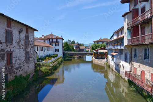 Fototapeta Naklejka Na Ścianę i Meble -  River Nive at Saint-Jean-Pied-de-Port, a commune in the Pyrénées-Atlantiques department in south-western France close to Ostabat in the Pyrenean foothills