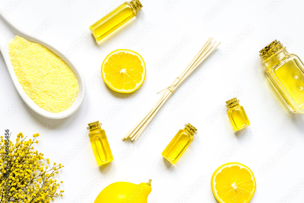 Spa set with oils and salt on white background top view Spa set with oils and salt on white background top view