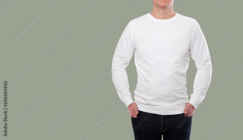 young man in white sweatshirt, white hoodies on grey green background young man in white sweatshirt, white hoodies on grey green background