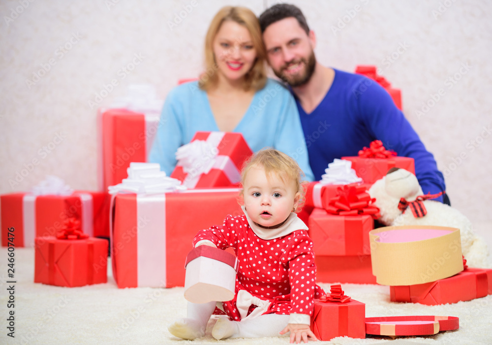 Perfect celebration. Valentines day. Red boxes. Love and trust in family. Bearded man and woman with little girl. father, mother and doughter child. Shopping online. Happy family with present box Perfect celebration. Valentines day. Red boxes. Love and trust in family. Bearded man and woman with little girl. father, mother and doughter child. Shopping online. Happy family with present box
