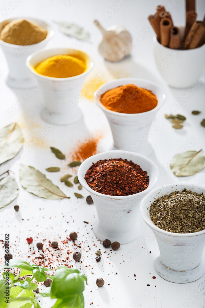 Wooden table of colorful spices Wooden table of colorful spices