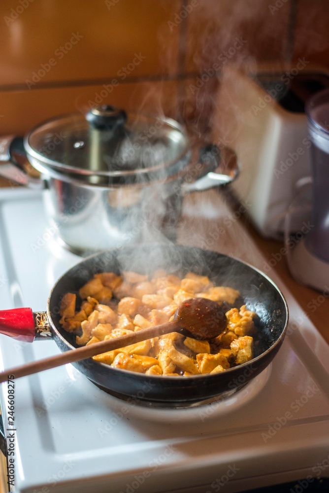 chicken meat cooking in pan. chicken meat cooking in pan.