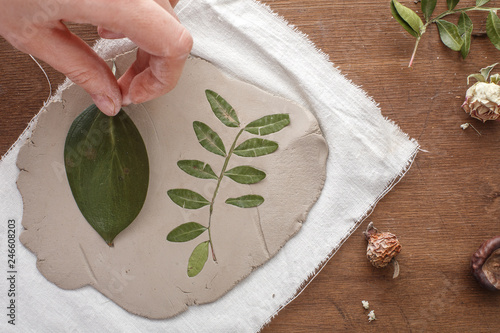 Obraz na plátně creative ceramist makes products of white and red clay