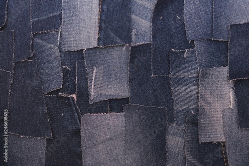 Torn denims shot layflat.