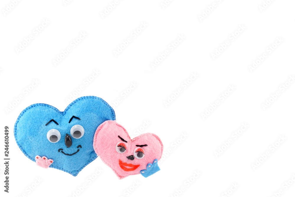 Fototapeta premium small soft homemade toy in the form of a heart for Valentine's Day on a white isolated background