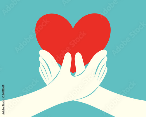 Hands holding a red heart
