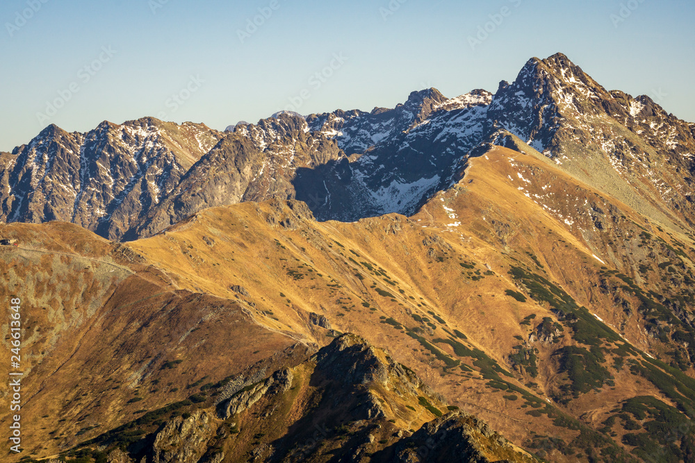 Majestic peaks of the Tatra Mountains in the autumn landscape. Majestic peaks of the Tatra Mountains in the autumn landscape.