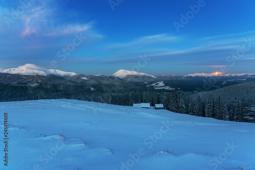 Charming lunar and starry nights with the Milky way in the Ukrainian Carpathians with mountain houses. © reme80