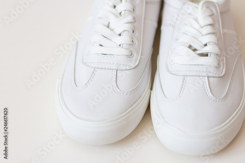 pair of white shoes isolated on white background