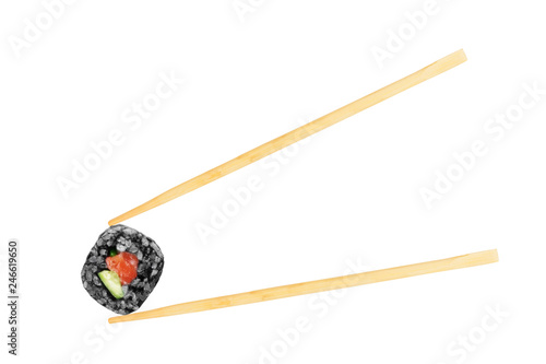 Isolated sushi roll with chopsticks