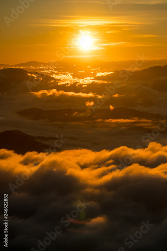 sunrise and sea of fog view on phu chi fa mountain area and national forest park in chiang rai  Thailand.