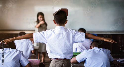 Teacher punish the offending students-extend the arms - Image