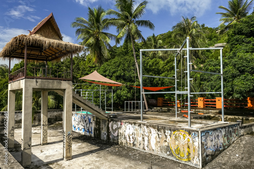 Abandoned tourist resort in Koh Phangan Thailand. Infinity pool without water. © Skaniai