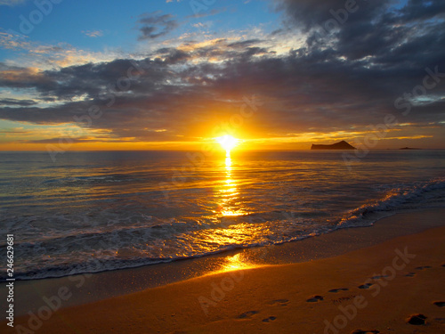 Early Morning Sunrise on Waimanalo Beach over ocean