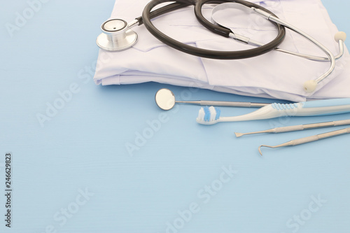 Dental care tools use for dentist in the clinic. Blue background