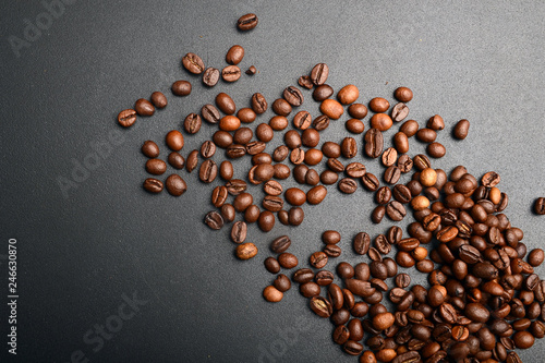 Coffee beans. On a wooden background. Top view. Copy space.