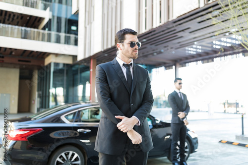 Alert Bodyguards Doing Their Duties Escorting Client