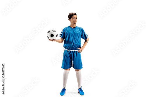 Young fit boy with soccer ball standing isolated on white as winner. The football soccer player on studio background. © master1305