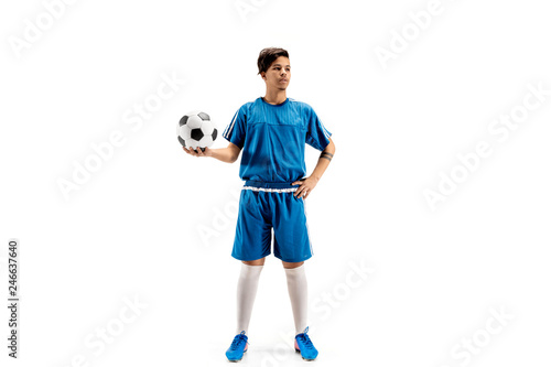 Young fit boy with soccer ball standing isolated on white as winner. The football soccer player on studio background. photo