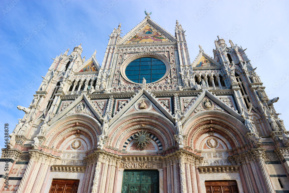 Monumental and beautiful facade of Metropolitan Cathedral of Saint Mary of the Assumption, Siena, Tuscany, Italy