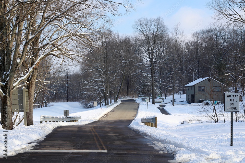 The long empty road in the snowy landscape. The long empty road in the snowy landscape.