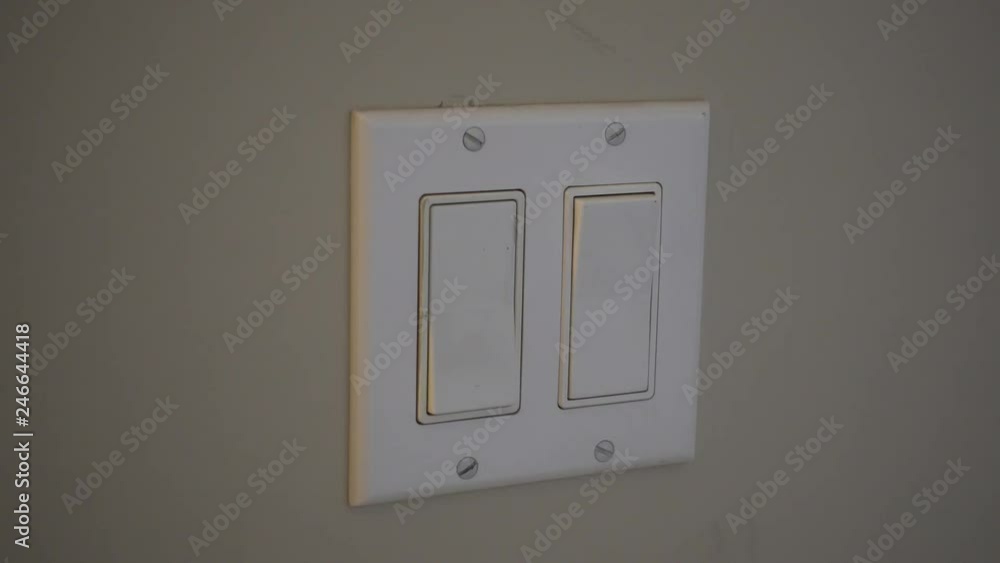 4K Mans Hand Turning Off Light Switch In Double Switch 4K Mans Hand Turning Off Light Switch In Double Switch