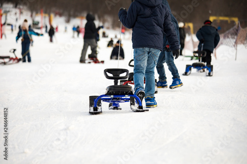 boy hand a sledge