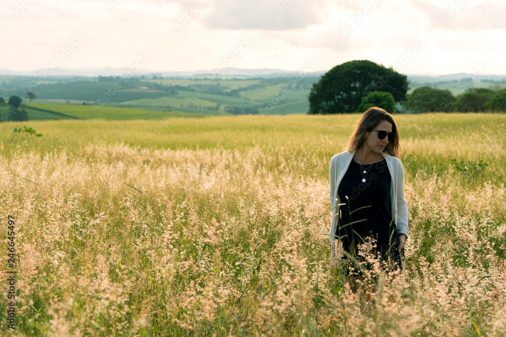 young woman enjoying the landscape. young woman enjoying the landscape.