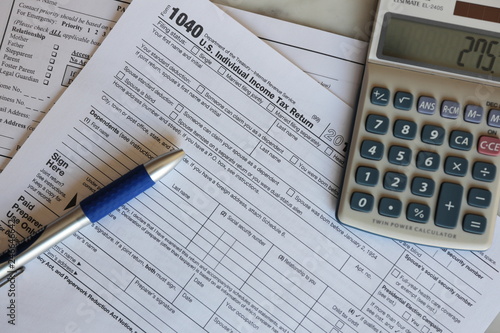 Tax Forms calculator pen paper finance business 
