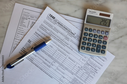 Tax Forms calculator pen paper finance business 