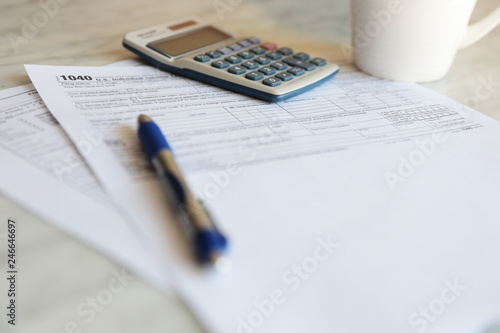 Tax Forms calculator pen paper finance business 