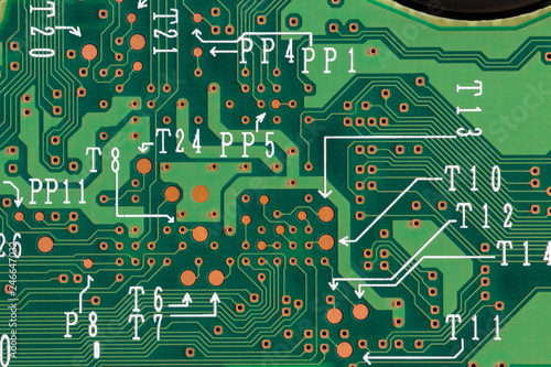 Closeup of green printed computer circuit boards. Top view.