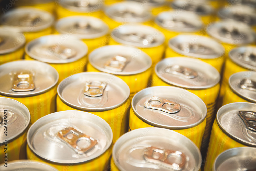 Standard yellow energy cans accumulated in the market ranked views from above with repetition to be consumed. Refreshment coolant crates Standard yellow energy cans accumulated in the market ranked views from above with repetition to be consumed. Refreshment coolant crates