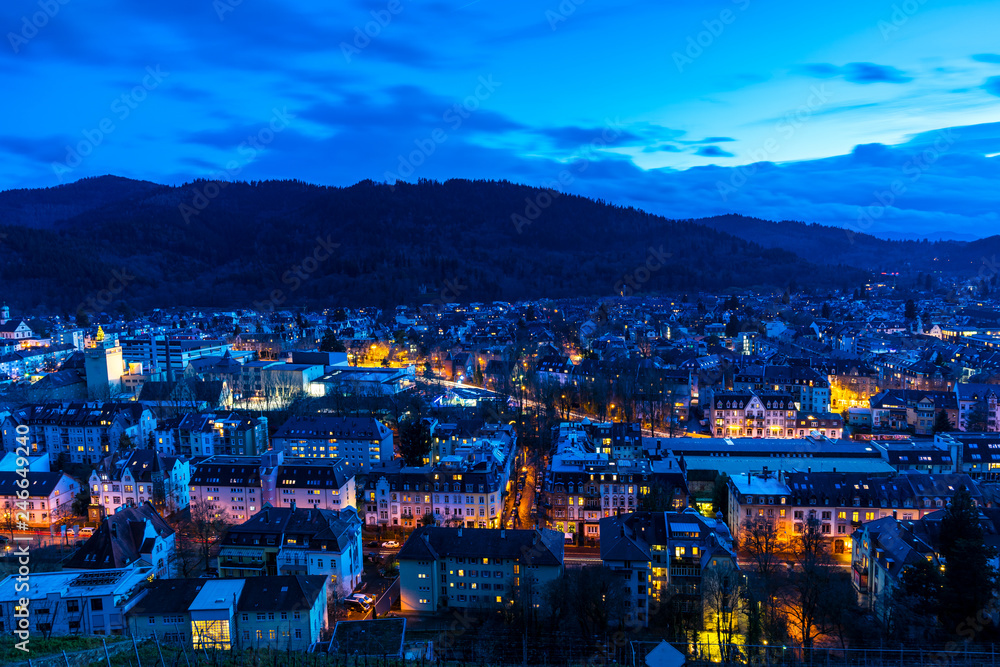 Fototapeta premium Germany, City freiburg im breisgau in stunning blue hour mood from above